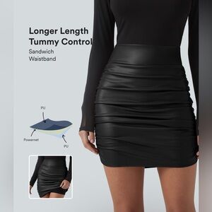 HALARA Black High Waisted Tummy Control Ruched Curved Hem PU Mini Bodycon Skirt